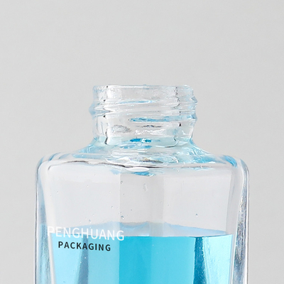 Le compte-gouttes carré de sérum d'huile d'essence de 30ml met en bouteille l'emballage en verre clair de soins de la peau de corps