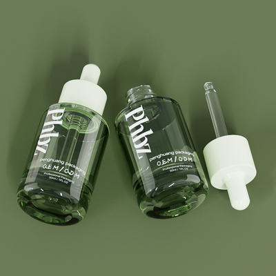 Bouteille verte en verre de luxe de sérum de bouteilles de compte-gouttes d'OEM 30ML 1oz