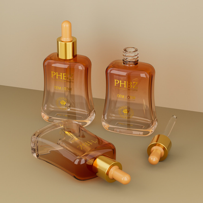 Bouteille de sérum d' huile d' essence de 50 ml dans un emballage de soins de la peau avec sérigraphie