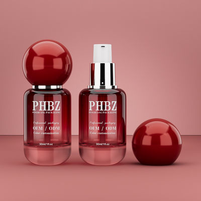 Flacon cosmétique vide en verre dégradé rouge de 30 ml / 1 oz avec bouchon à bille ronde, emballage de soins de la peau personnalisé couleur OEM ODM pour lotion et huile essentielle
