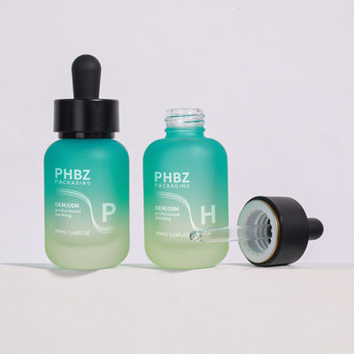 Selon les exigences du client, flacons compte-gouttes de sérum en verre de 30 ml, ronds, mats, avec bouchon de type durable et option d'emballage