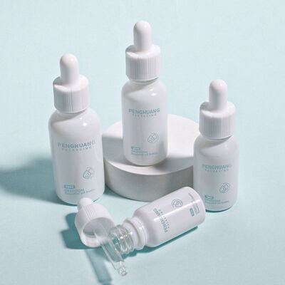 Logo Bouteille d'huile de sérum ronde personnalisée Conception anti-fuite durable Convient pour les huiles essentielles, les soins de la peau et les emballages cosmétiques