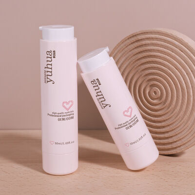 Bouteille de lotion en plastique durable avec pompe sans air et design personnalisé, idéale pour l'emballage cosmétique et le stockage de produits liquides