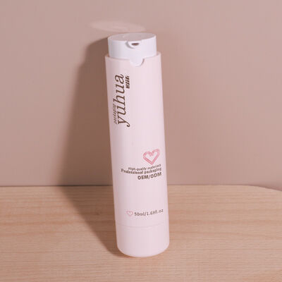 Bouteille de lotion en plastique durable avec pompe sans air et design personnalisé, idéale pour l'emballage cosmétique et le stockage de produits liquides