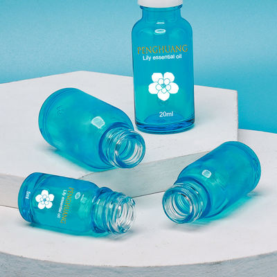 Bouteille en verre d'Essentail de compte-gouttes en bambou bleu d'huile avec Logo Printing fait sur commande