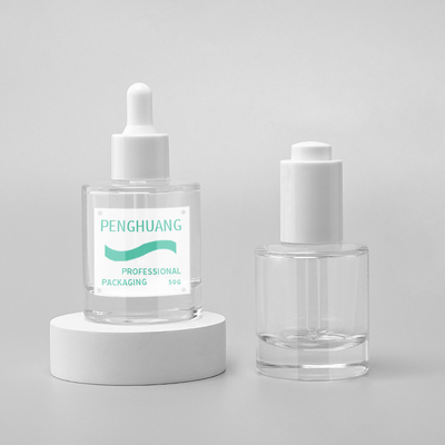 Le compte-gouttes vide en verre d'huile essentielle de sérum met des soins de la peau en bouteille cosmétiques empaquetant 1OZ 30ml