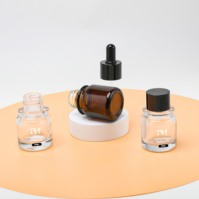 Bouteille en verre Mini Amber Color Customized de chapeau de compte-gouttes d'emballage d'huile de soins de la peau