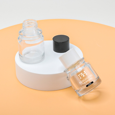 Bouteille en verre Mini Amber Color Customized de chapeau de compte-gouttes d'emballage d'huile de soins de la peau