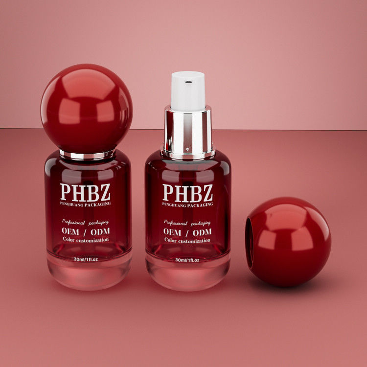 Flacon cosmétique vide en verre dégradé rouge de 30 ml / 1 oz avec bouchon à bille ronde, emballage de soins de la peau personnalisé couleur OEM ODM pour lotion et huile essentielle