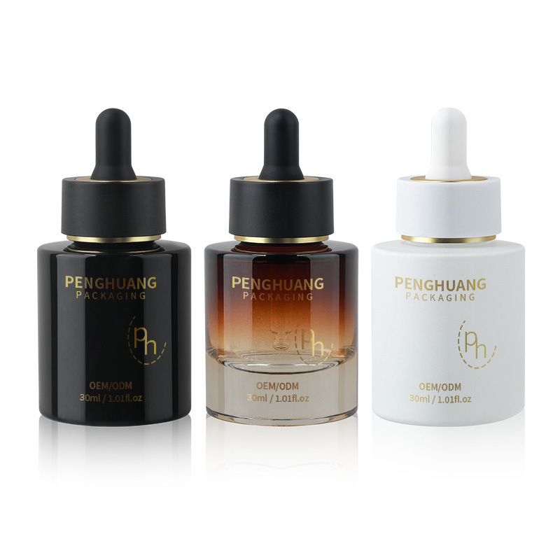 Bouteille gouttelette en verre ronde avec logo personnalisé selon les exigences du client