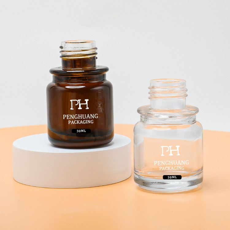 Bouteille en verre Mini Amber Color Customized de chapeau de compte-gouttes d'emballage d'huile de soins de la peau