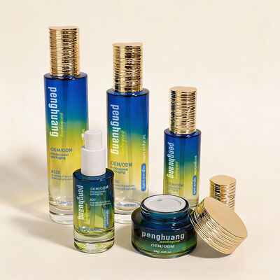 Ensemble de bouteilles en verre dégradé de luxe personnalisé pour les emballages de soins de la peau et de la beauté OEM ODM Ensemble de bouteilles en verre cosmétique avec pot