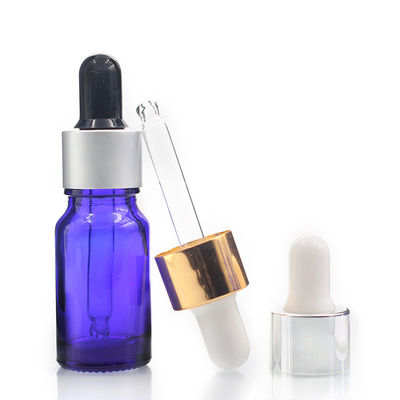le compte-gouttes en verre vide de la bouteille 10ml bleue met en bouteille avec des bouteilles en verre de compte-gouttes de pipette