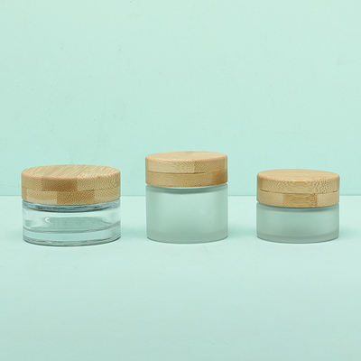Pot crème cosmétique en verre d'emballage de crème de visage 30g avec le chapeau en bambou de vis