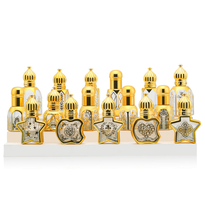 Emballage de beauté Mini Glass Roll On Bottles 12ml pour le parfum empaquetant le scintillement d'or
