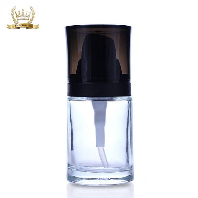 Bouteille cosmétique en verre claire de haute qualité de base de visage de l'emballage 30ml avec la pompe