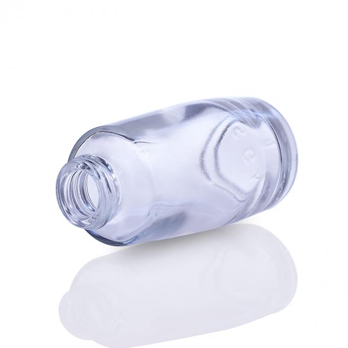 concevez la bouteille en fonction du client cosmétique en verre de la base 30ml avec la pompe de mode pour le maquillage liquide