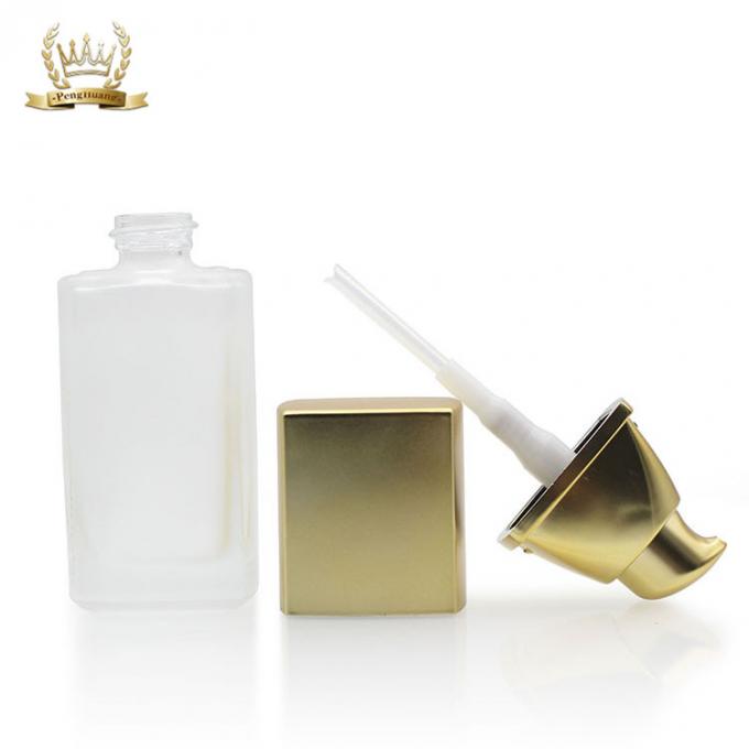 Bouteille liquide cosmétique en verre givrée de base de la bouteille 30ml de base avec la pompe d'or