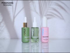 Le compte-gouttes de fantaisie en verre imprimé du sérum 1oz met en bouteille pour l'emballage cosmétique